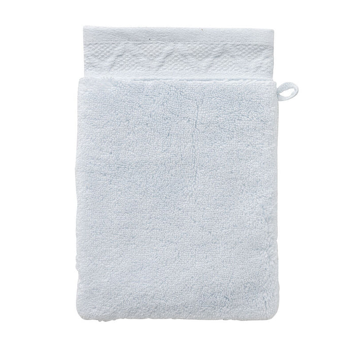 White textured washcloth on a white background