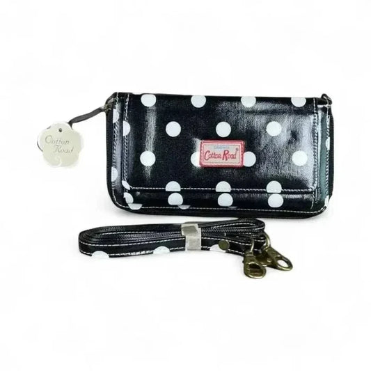 Cotton Road Sling Wallet black with large white polka dots and removable shoulder strap
