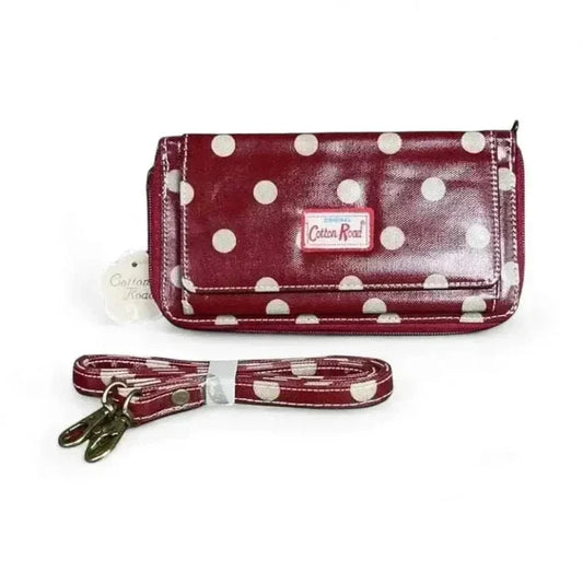 Cotton Road Sling Wallet in red with large white polka dots and removable strap