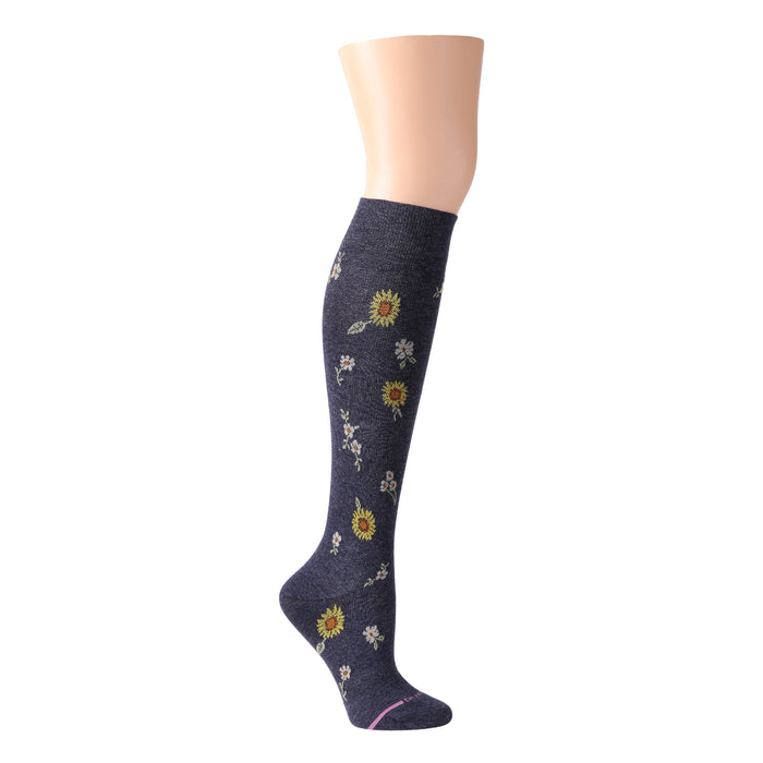 Knee-high compression socks featuring a navy background with sunflower and floral patterns.