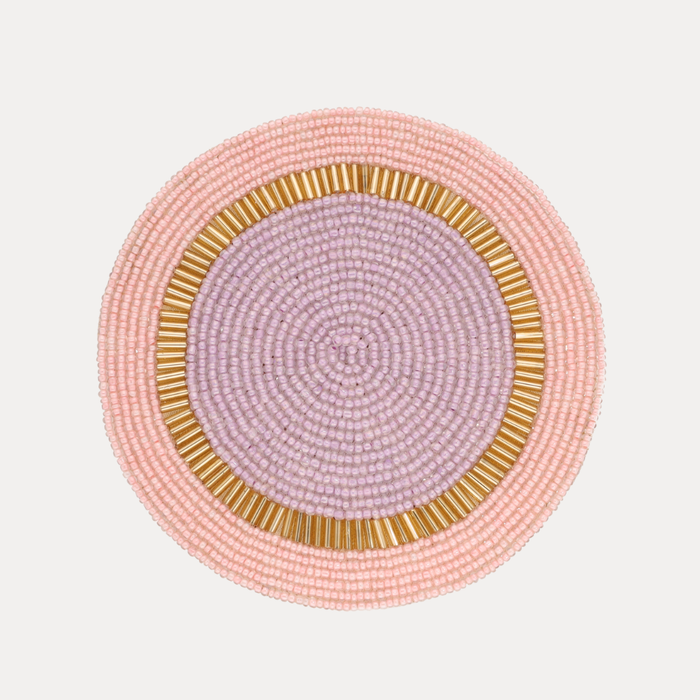a close up of a beaded coaster