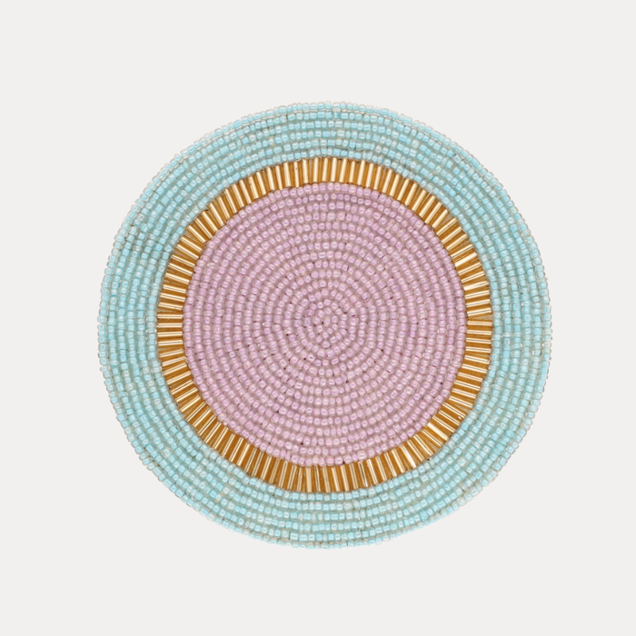 a close up of a beaded coaster