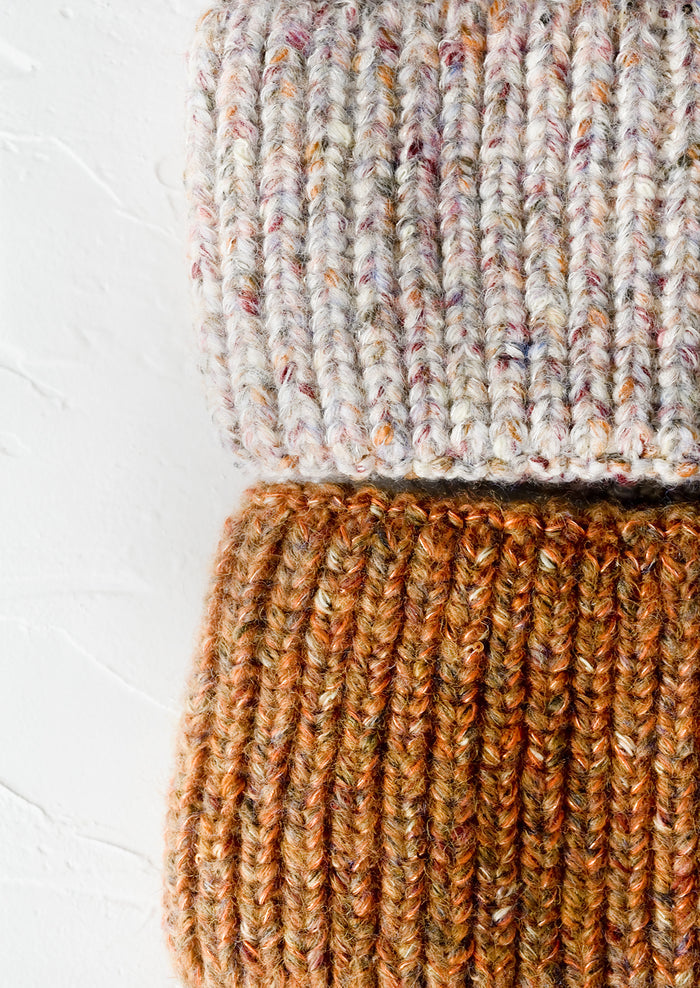 Rib knit yarn with multicolor speckles.