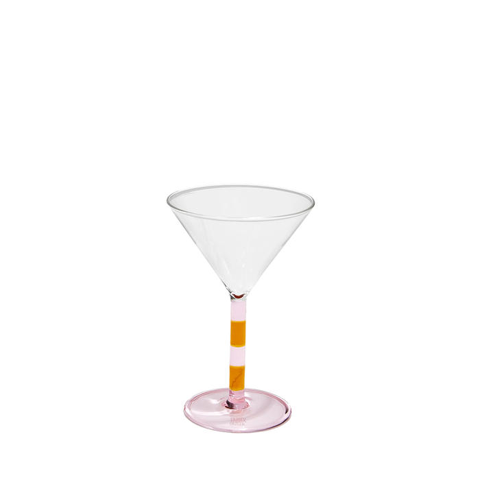 Clear martini glass with pink and amber striped stem and pink base.